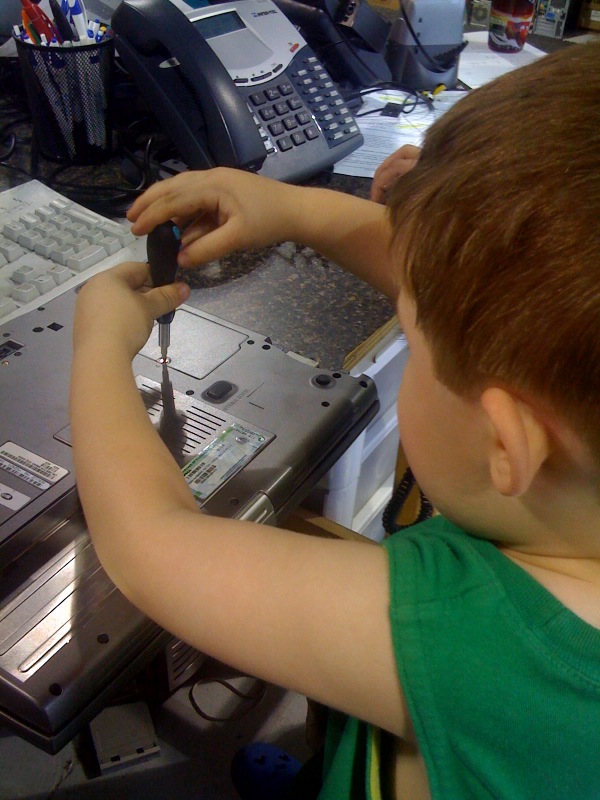 Jacob Schrock Fixing Laptop